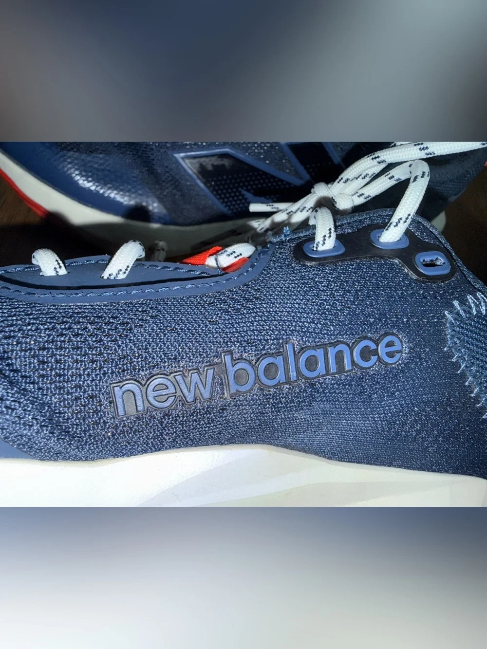 New Balance Navy and Red Sneakers